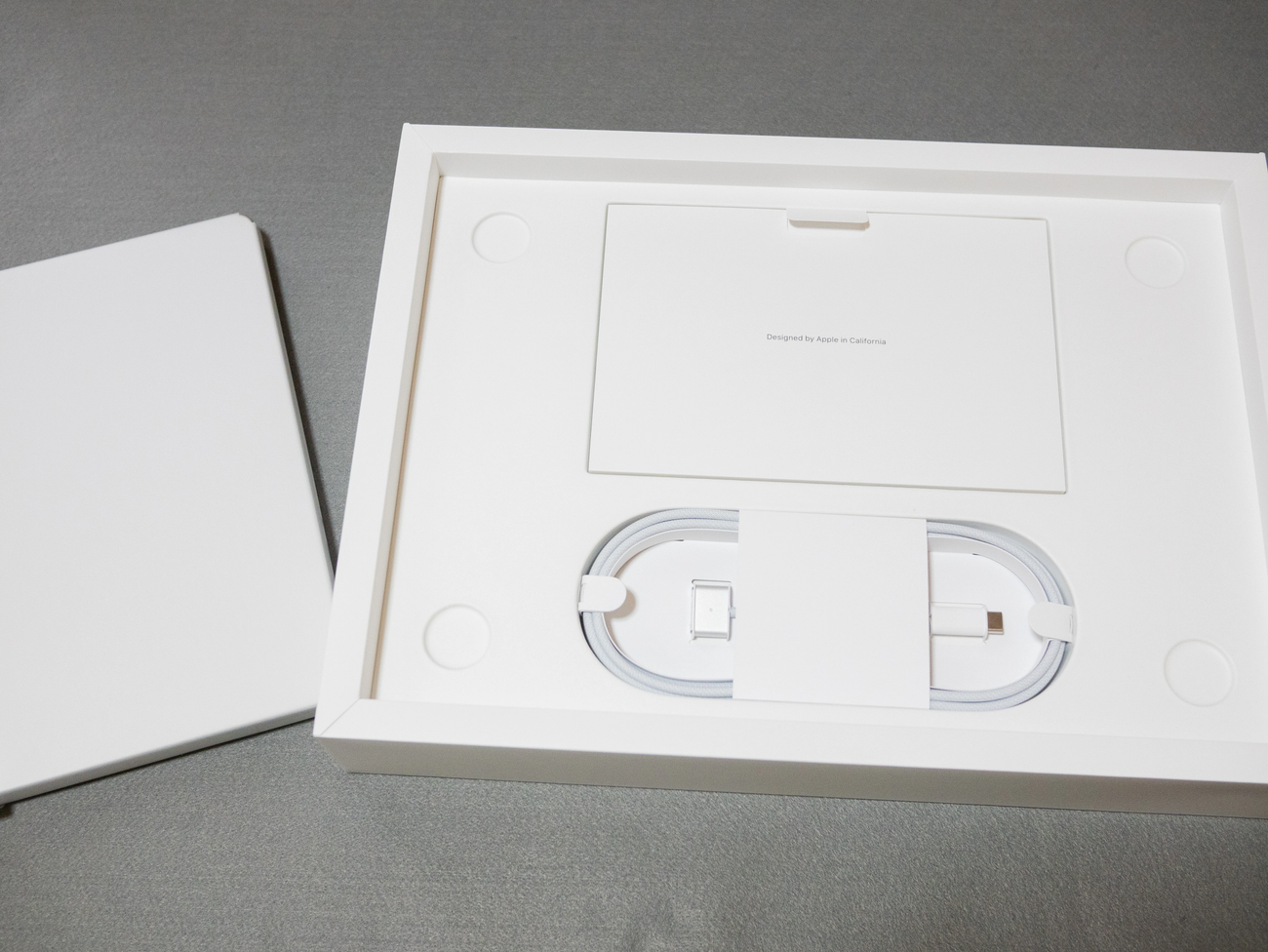 Designed by Apple in California